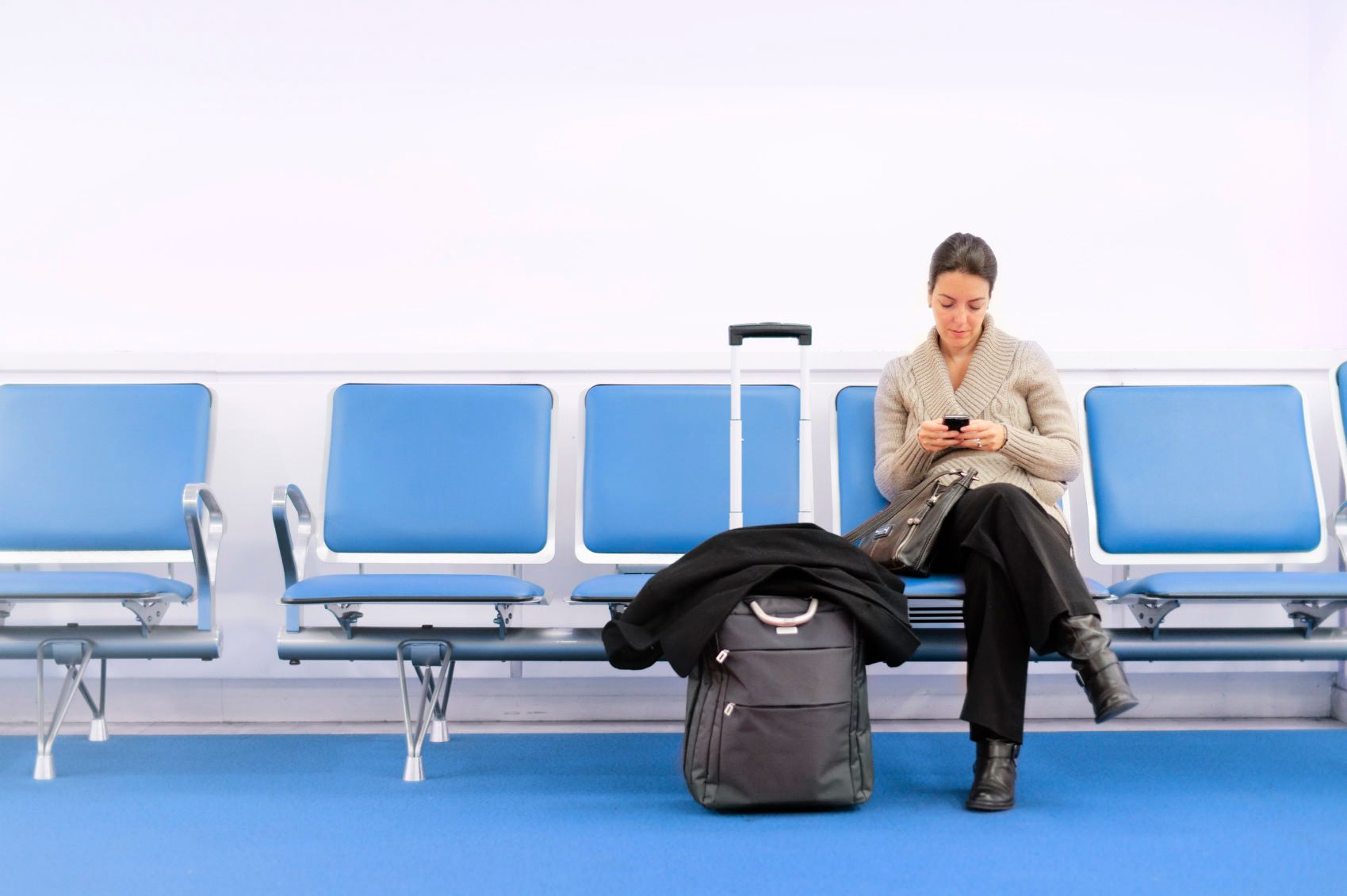 Waiting Traveller Using Smartphone