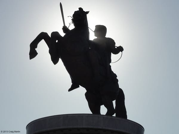 Alexander the Great graces the central square.