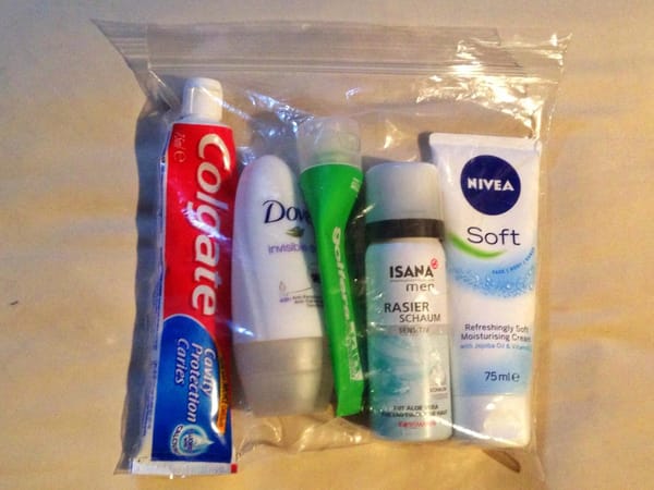 Small toiletries in a plastic bag for flights.