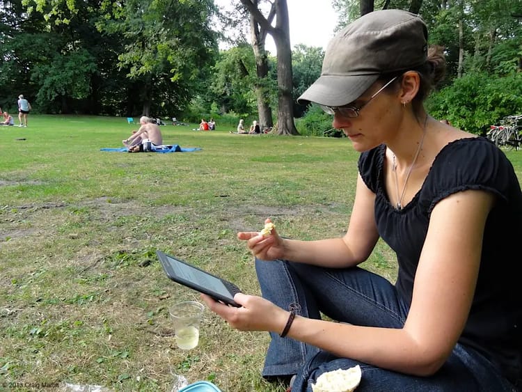Linda in the Tiergarten, Berlin with Kindle