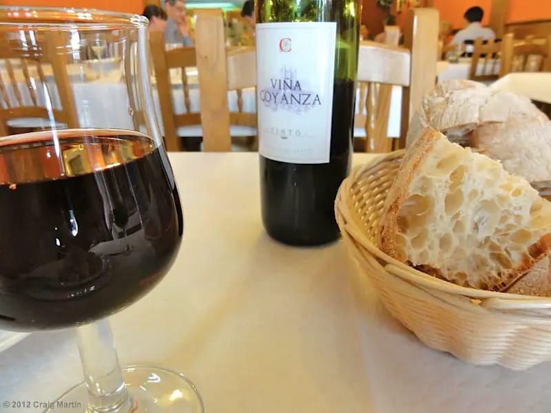 Bread and wine are often included.